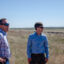 Rusty Bell, director of Gillette College’s Office of Economic Transformation, and Justin Loyka, energy program director with the Nature Conservancy in Wyoming, discuss potential solar sighting on coal mines near Gillette, Wyo. Credit: Jake Bolster/Inside Climate News