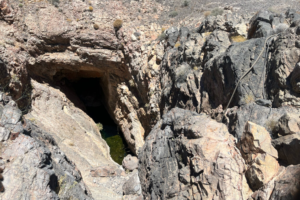 Hidden away at Ash Meadows National Wildlife Refuge is Devil's Hole, a water-filled cavern that is home to the world's most endangered fish. Credit: Wyatt Myskow/Inside Climate News