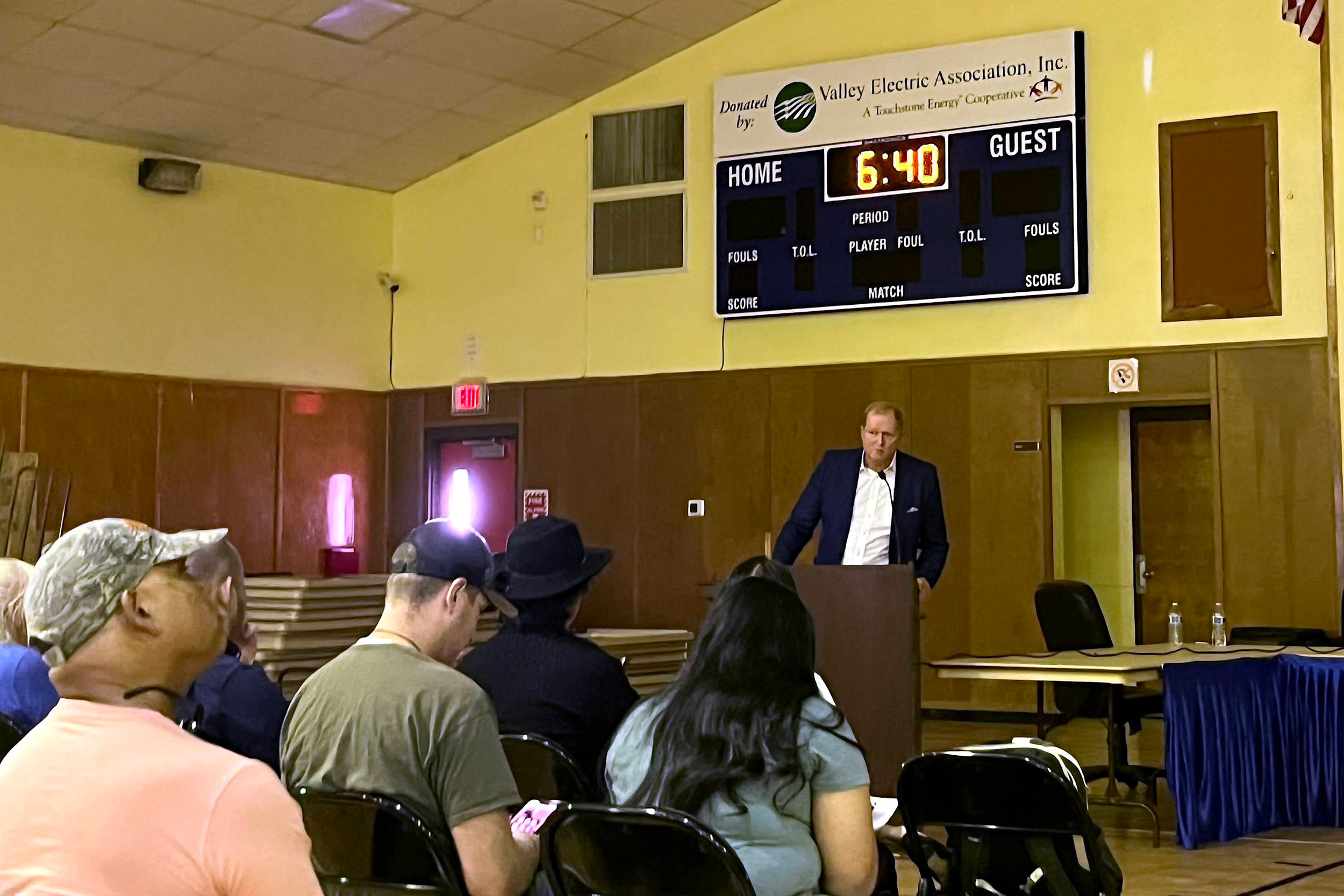 Judson Culter, the CEO and founder of Rover Critical Minerals, presents his company's plans for exploratory drilling for lithium to the community of Armargosa on June 20. Credit: Wyatt Myskow/Inside Climate News