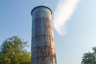 The water tower is a defining feature of the Bynum skyline and has stood for 75 years. Credit: Lisa Sorg/Inside Climate News