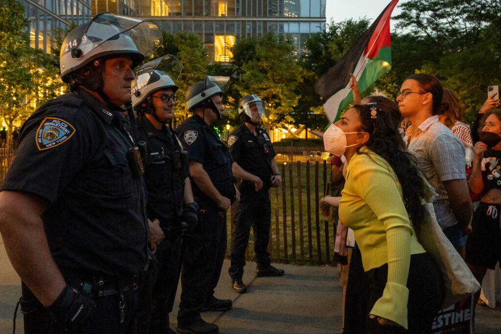 Police and protesters clashed verbally after 18 demonstrators were arrested on Tuesday. Credit: Keerti Gopal/Inside Climate News