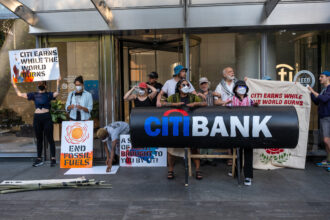 Climate activists blockaded the doors to Citigroup's headquarters in New York City on Friday morning. Credit: Keerti Gopal/Inside Climate News