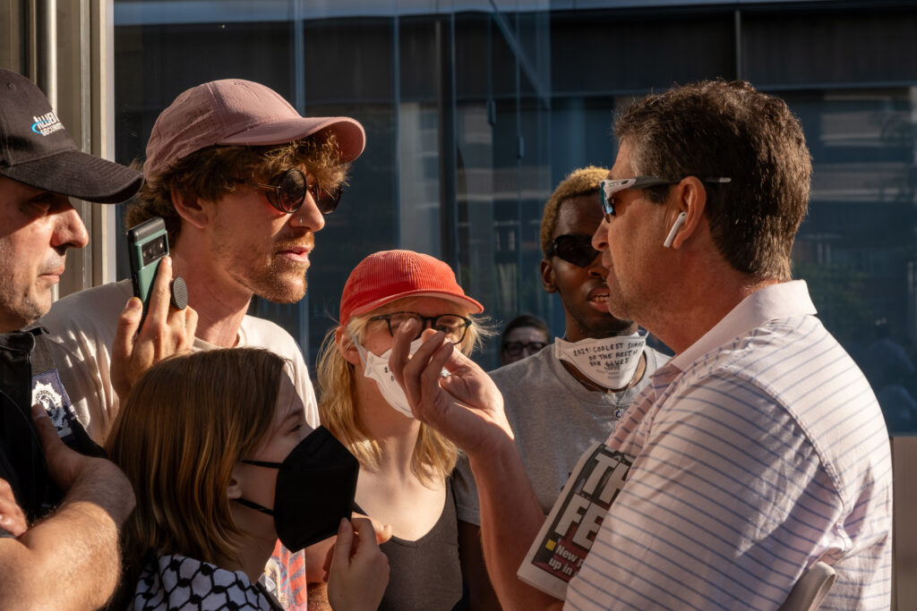 Some onlookers expressed frustration to the demonstrators on Friday and tried to engage in debate. Credit: Keerti Gopal/Inside Climate News