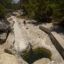 The water in Jacob's Well is at its lowest level in memory, in August 2023. Usually, it gushes into the bed of Cypress Creek, which is currently dry. Credit: Dylan Baddour/Inside Climate News.