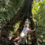 Natalia Greene, an Ecuadorian environmentalist and judge with the International Rights of Nature Tribunal, walks through the Chocó Andino cloud forest with her family in Mindo, Ecuador. Credit: Katie Surma