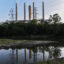 The J.M. Stuart Station, a coal plant that closed in 2018, is seen behind the Three Mile Creek near Manchester, Ohio. Credit: Stephanie Keith/Getty Images