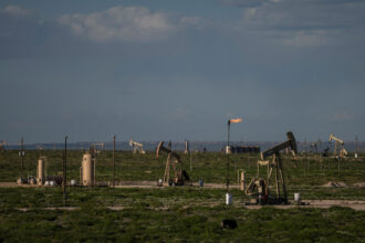 Pump jacks operate in a Permian Basin oilfield near Eddy County, New Mexico. Credit: Paul Ratje/AFP via Getty Images