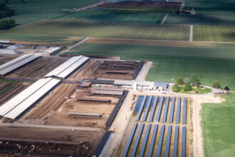 A San Joaquin Valley dairy farm is viewed from above on April 13, 2023, in Visalia, Calif. Credit: George Rose/Getty Images