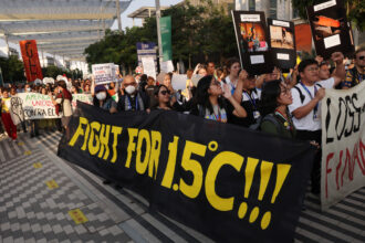 Activists march in protest on day nine of the COP28 Climate Conference on Dec. 9, 2023 in Dubai, United Arab Emirates. Credit: Sean Gallup/Getty Images