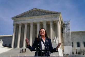 Florida Attorney General Ashley Moody speaks with the media after oral arguments were heard by the U.S. Supreme Court to determine whether the controversial Florida and Texas social media laws can stand on Feb. 26 in Washington, D.C. Credit: Jahi Chikwendiu/The Washington Post via Getty Images