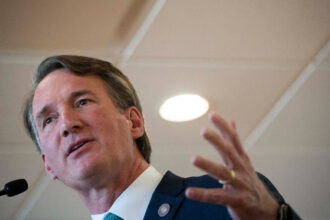 Gov. Glenn Youngkin delivers remarks to the media following the adjournment of the 2024 Virginia General Assembly on March 14 in Richmond, Va. Credit: Minh Connors/The Washington Post via Getty Images