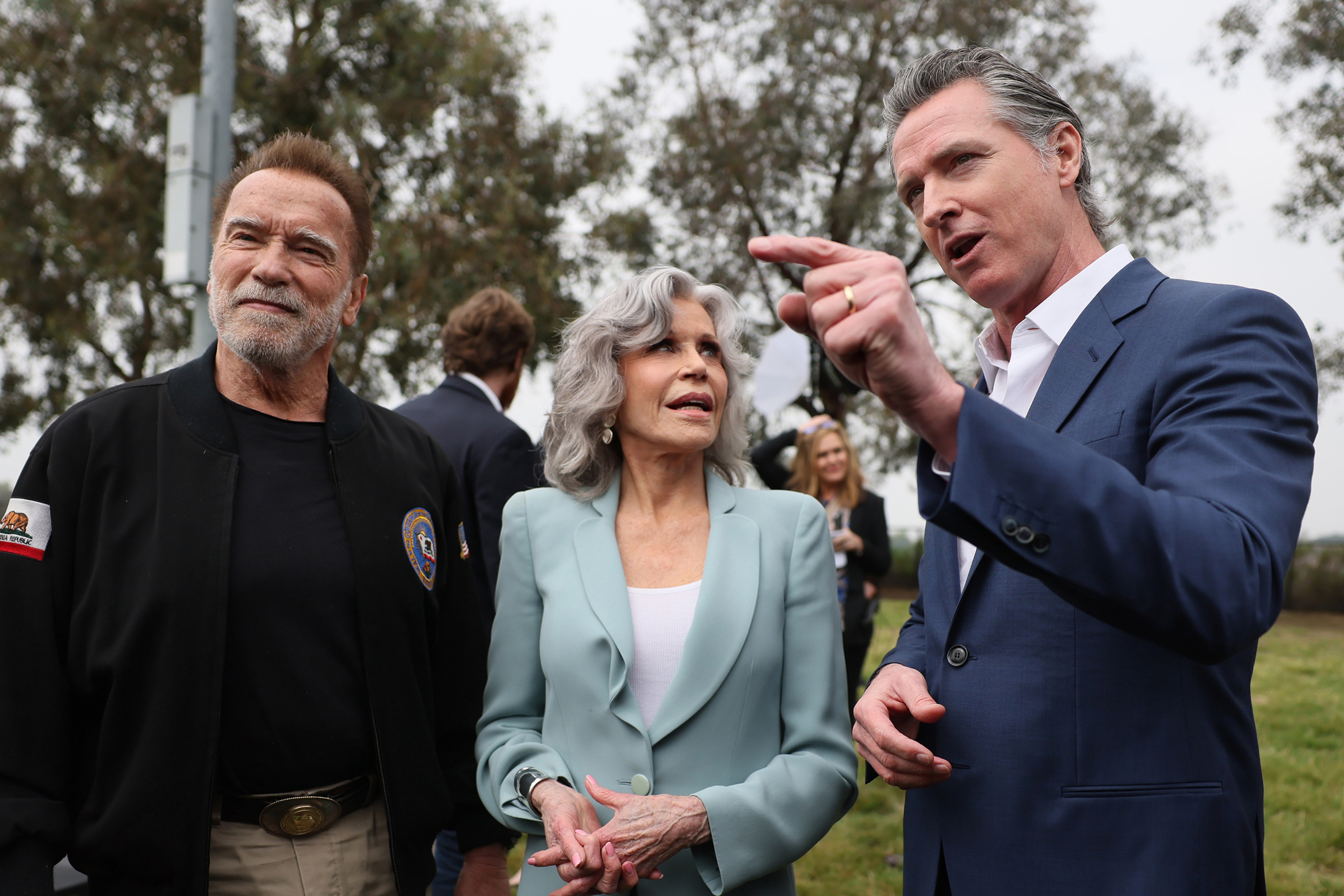 California Gov. Gavin Newsom (right), Jane Fonda (center) and former Governor Arnold Schwarzenegger attend a news conference hosted by the Campaign for a Safe and Healthy California in Ladera Heights on March 22. Credit: Robert Gauthier/Los Angeles Times via Getty Images