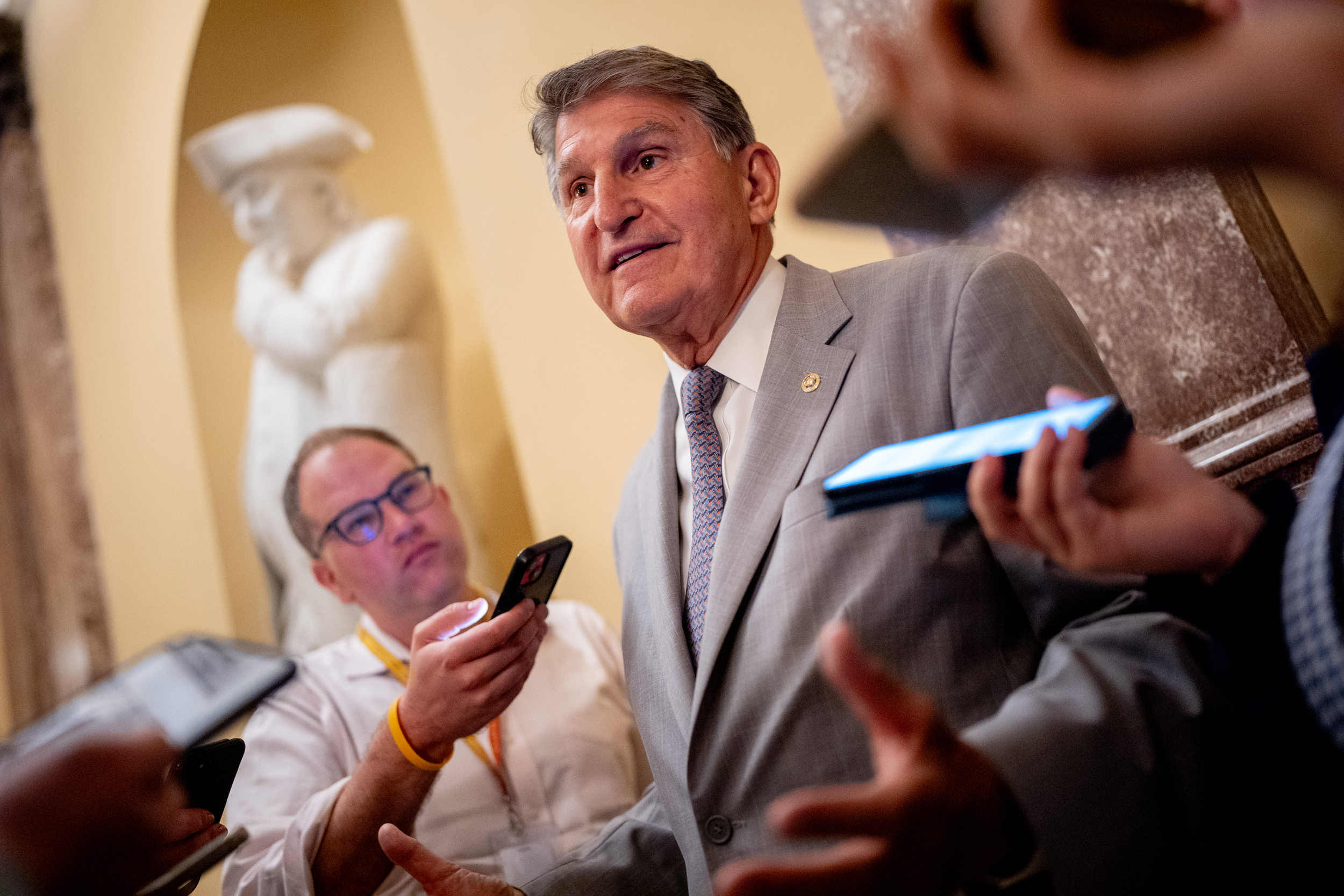 Sen. Joe Manchin speaks to reporters outside the Senate Chamber on June 3 in Washington, D.C. Credit: Andrew Harnik/Getty Images