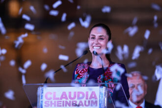 President-elect Claudia Sheinbaum speaks to a crowd after initial results showed she was leading the polls by a wide margin on Monday in Mexico City. Credit: Manuel Velasquez/Getty Images