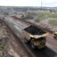 A truck loaded with coal drives away from the Eagle Butte Coal Mine in the Powder River basin. Credit: Matt McClain/The Washington Post via Getty Images