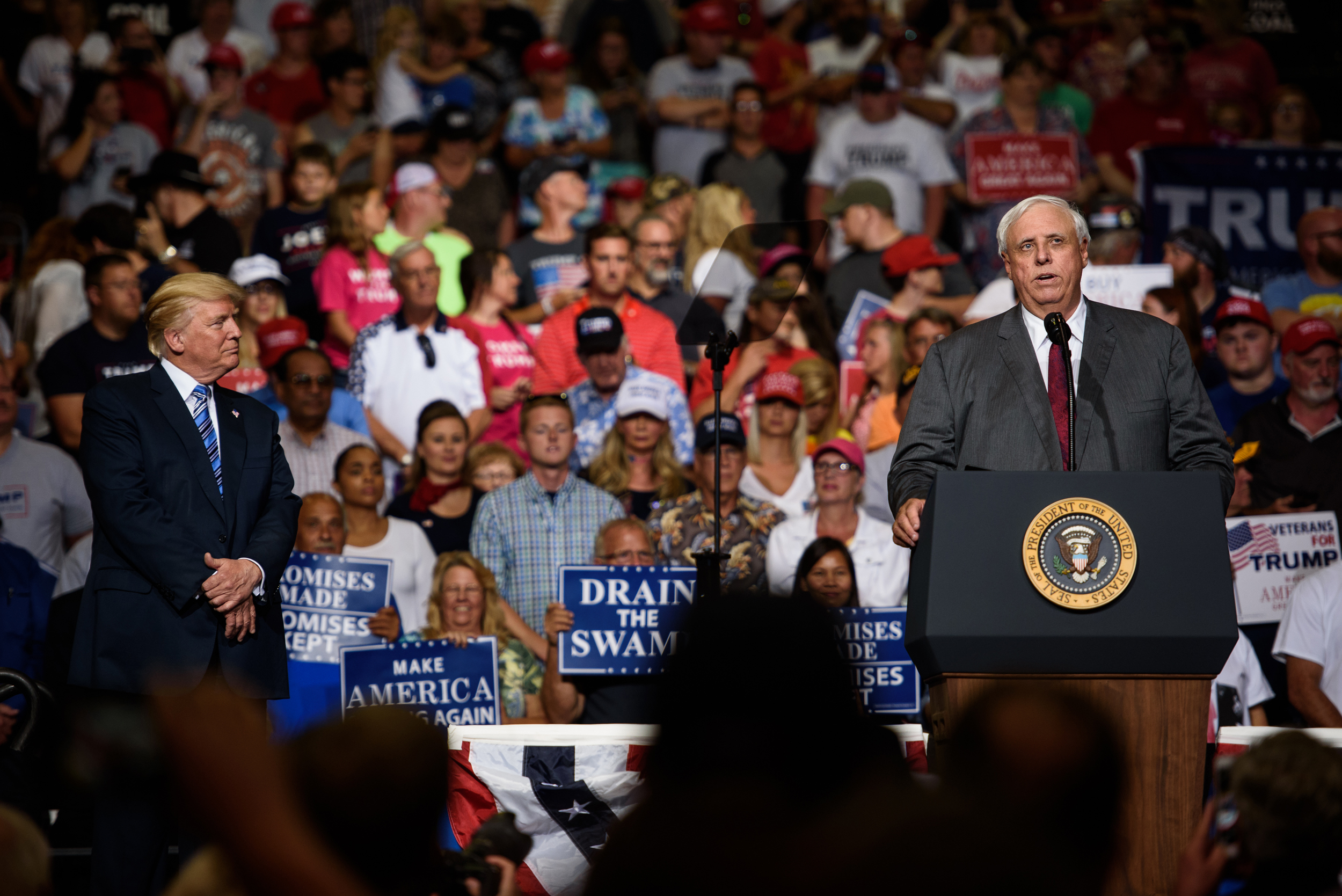 West Virginia Governor Jim Justice speaks next to President Donald Trump at a campaign rally in Huntington, West Virginia on Aug. 3, 2017. Credit: Justin Merriman/Getty Images