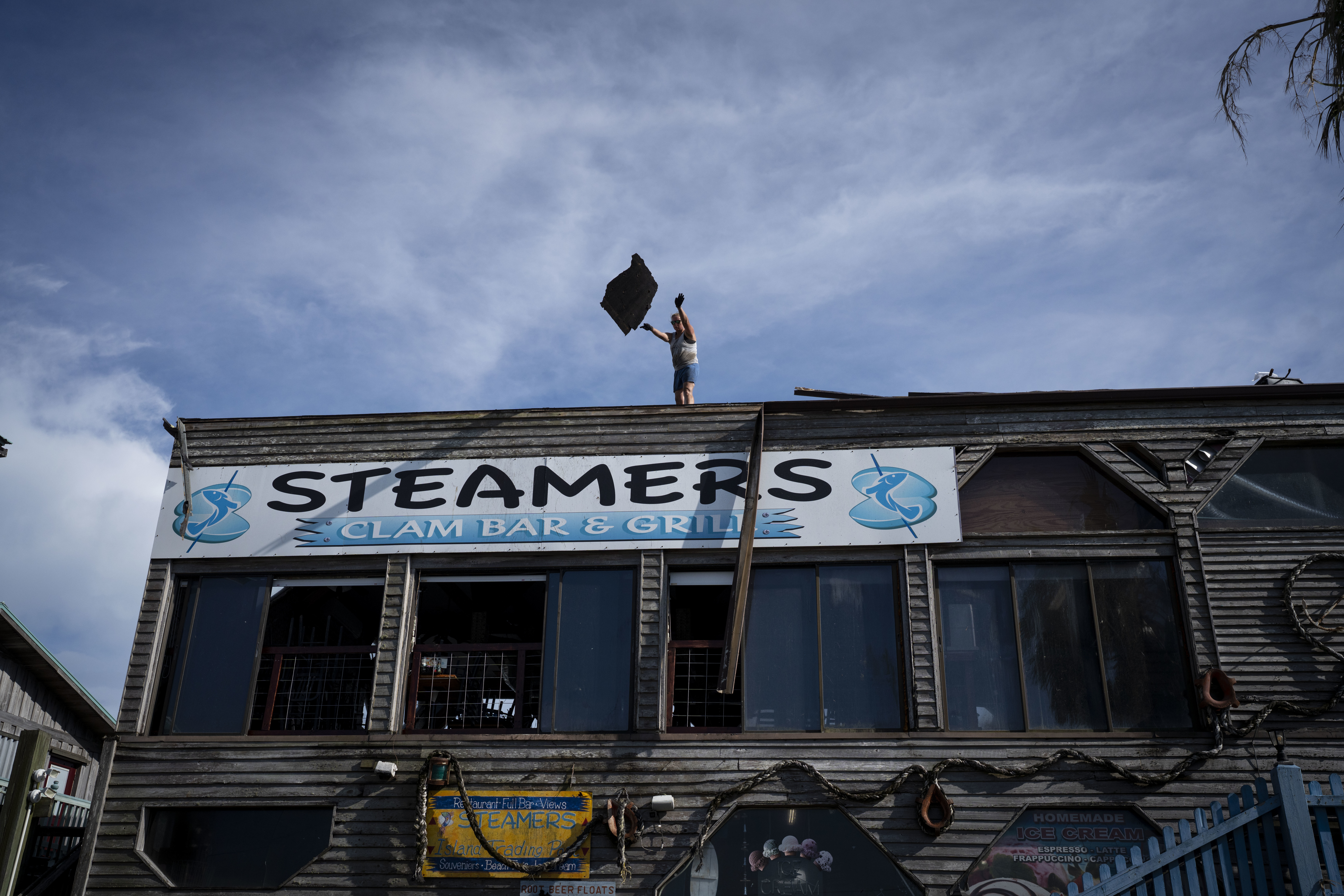 Cleanup efforts commenced in Cedar Key, Fla. on Thursday, August 31, 2023 a day after Hurricane Idalia passed through the area. Credit: Thomas Simonetti/The Washington Post via Getty Images