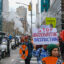 On Feb. 27, About 100 people marched from the New York Public Library’s flagship location in midtown Manhattan to the headquarters of three insurance companies. Credit: Keerti Gopal/Inside Climate News