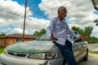 Robert Taylor stands outside his home, which is about a mile from the nation’s only chloroprene rubber plant, in Reserve, La. Credit: Lee Hedgepeth/Inside Climate News