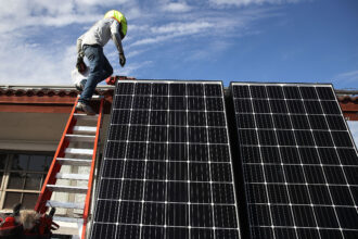Texas ranks third in the country in electricity generation from small-scale solar, including rooftop solar, trailing California and Arizona. Credit: Joe Raedle/Getty Images