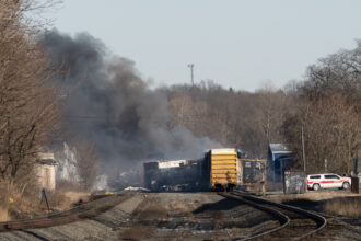 Smoke rises from a derailed cargo train in East Palestine, Ohio on Feb. 4, 2023. The train accident sparked a massive fire and evacuation orders. Credit: Dustin Franz/AFP via Getty Images